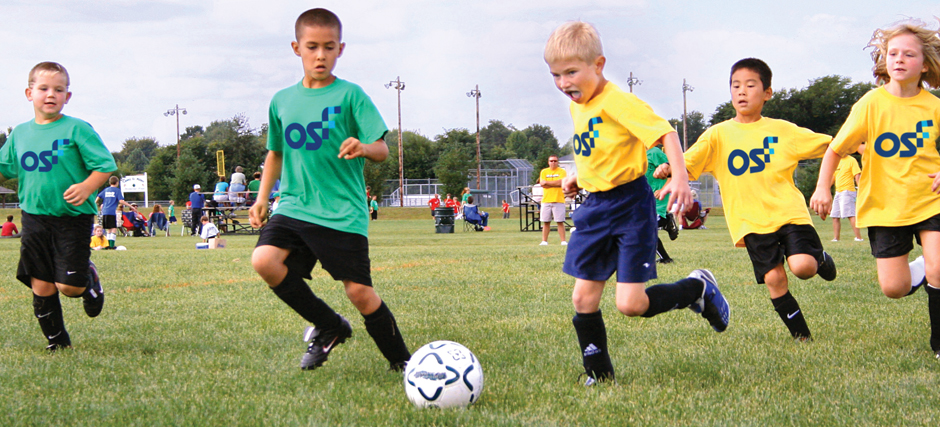 Kids playing football at OSF